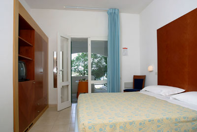 Foto interna di una camera dell'Hotel La Gattarella